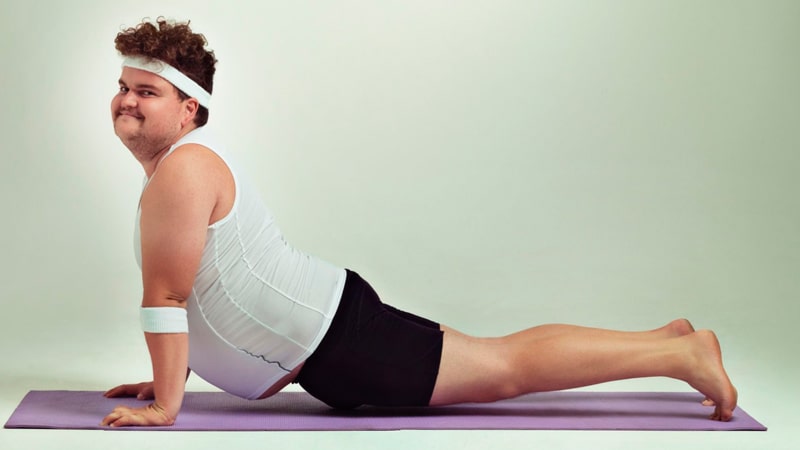 Persona obesa haciendo Pilates